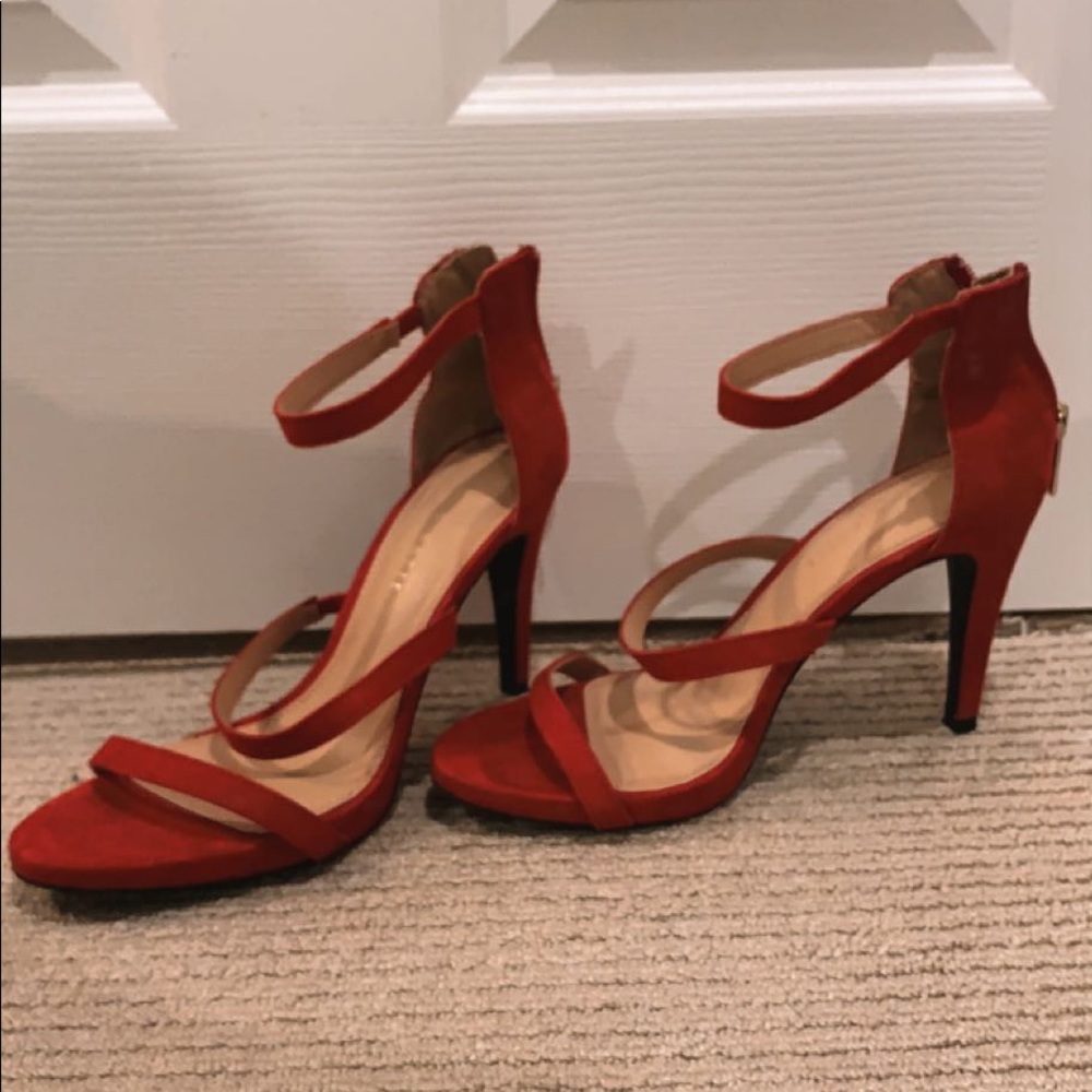 red heals with gold zipper, worn once